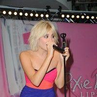 Pixie Lott performs after unveils her Autumn/Winter range